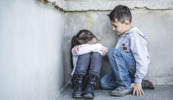 brother comforting sister