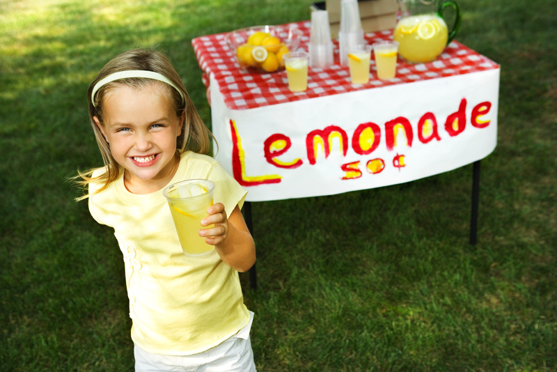 child with lemonade